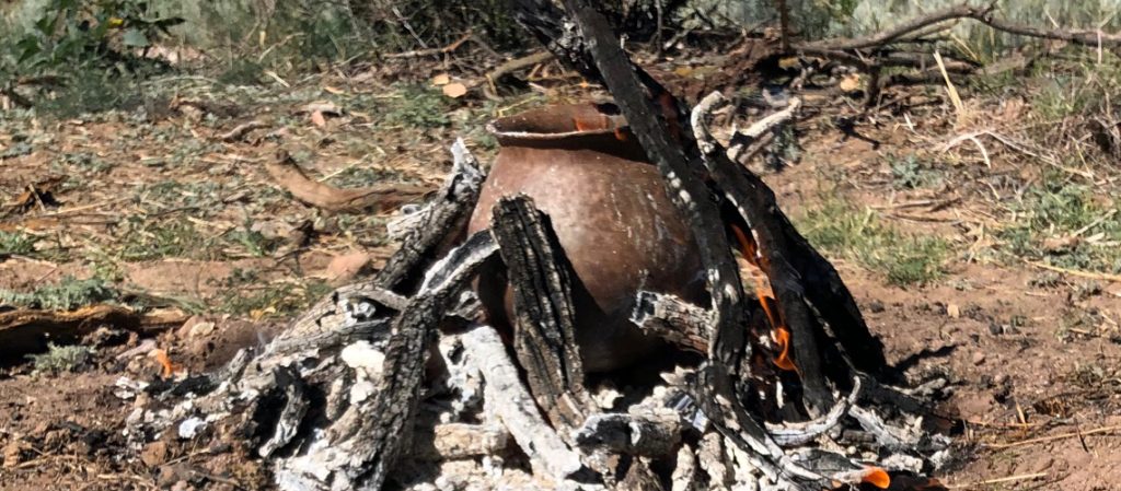 primitive pottery being fired