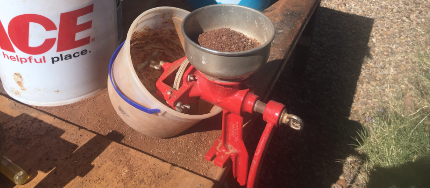 clay being ground in a mill