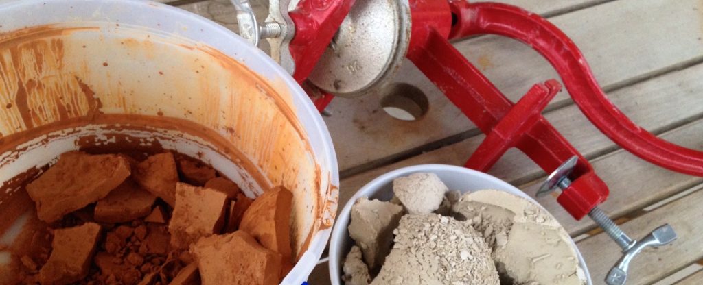natural clay and a grinder ready to process clay