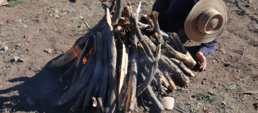 lighting an open pottery firing